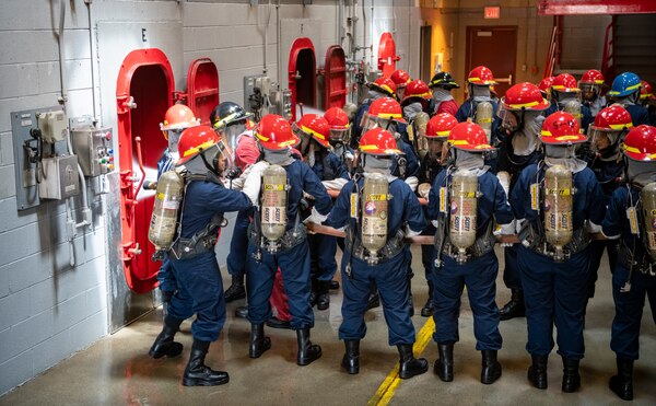 Recruits participate in firefighting and damage control training at Recruit Training Command.