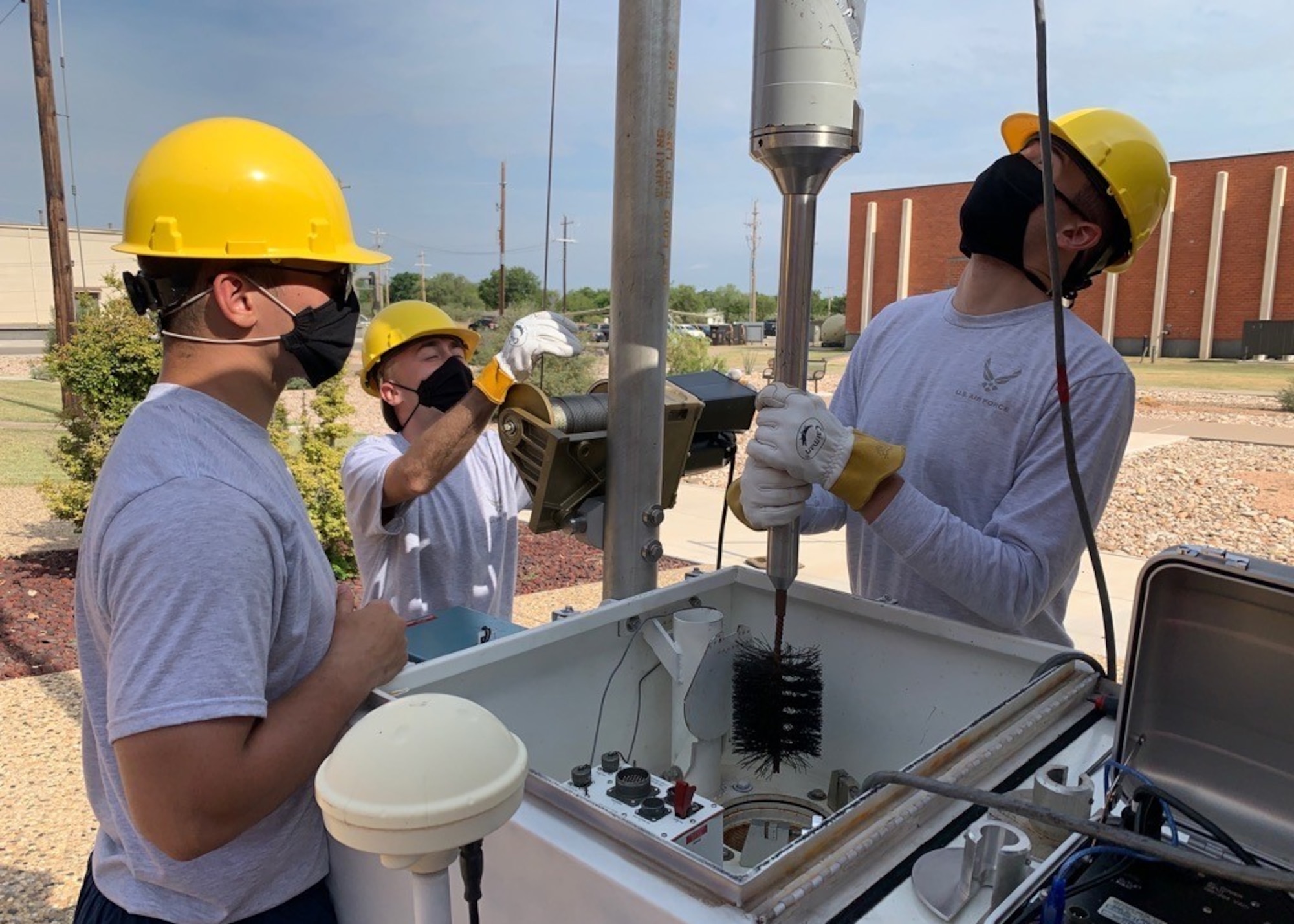 U.S. Air Force Airman from the 312th Training Squadron special instruments training course are learning to repair and reinstall a Geotech KS54000 Broadband Seismometer on Goodfellow Air Force Base, Texas, July 31, 2020. The Airman will soon be responsible for maintaining similar equipment across the globe in support of the United States Atomic Energy Detection System (USAEDS). (Courtesy photo)