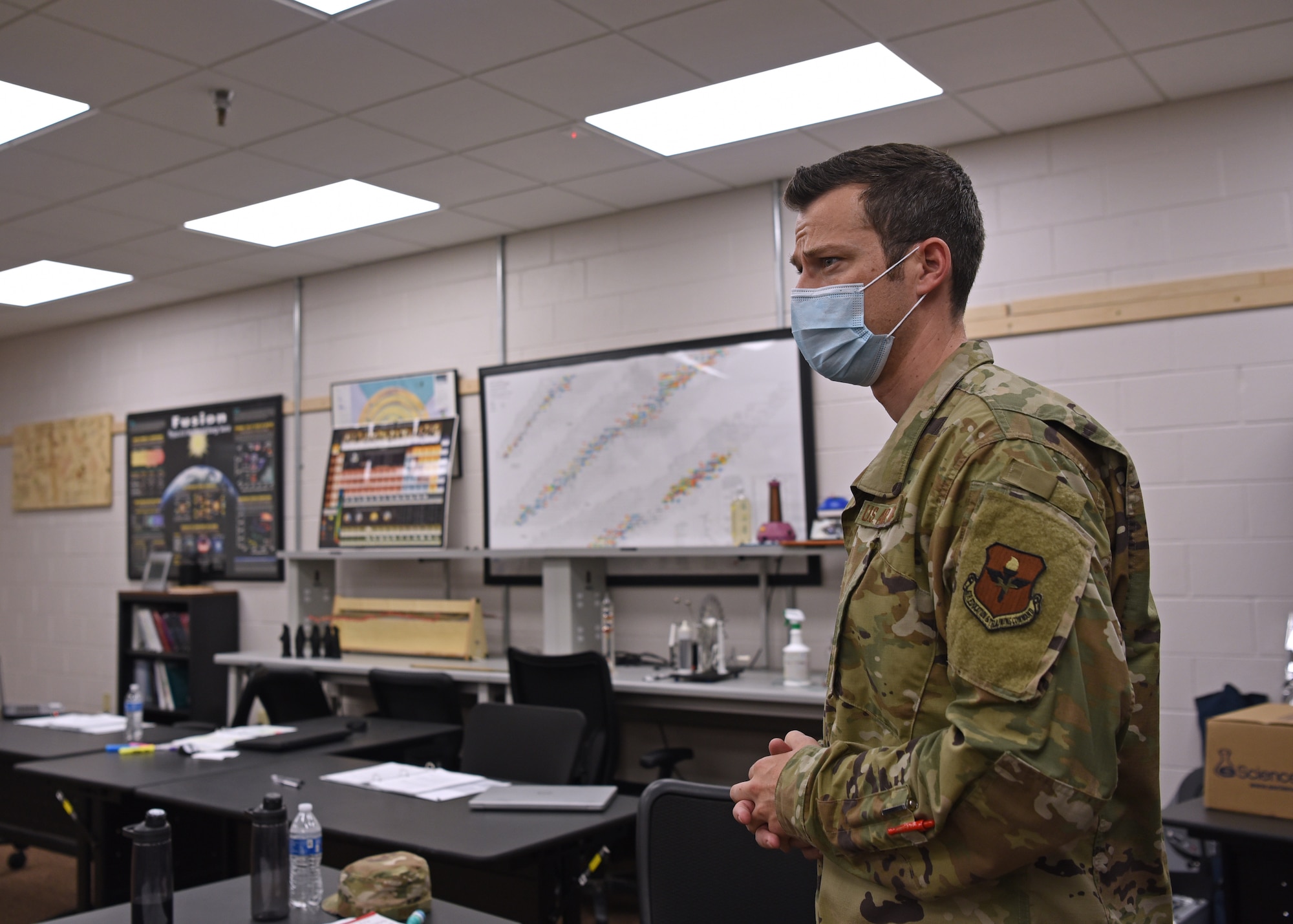 U.S. Air Force Tech. Sgt. David Hunt, 312th Training Squadron Special Instruments Training course instructor, discusses the SPINSTRA’s Nova Lab, short for Innovation Laboratory, containing four 3D printers as well as 3D modeling software for students to hone-in technical skills and gain mentorship, inside the Louis F. Garland Department of Defense Fire Academy on Goodfellow Air Force Base, Texas, Aug. 5, 2020.  Hunter and additional SPINSTRA instructors volunteered their time in the Nova Lab for students after classroom hours and during the weekends, and offered additional mentorship and educational opportunities for the students, while COVID-19 induced travel restrictions were active during the pandemic. (U.S. Air Force photo by Airman 1st Class Abbey Rieves)