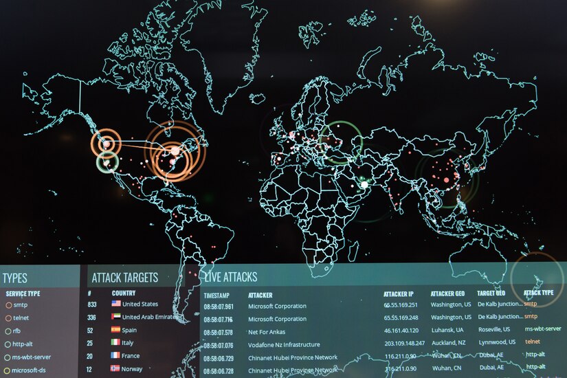 A computer screen shows a map of the globe overlaid with additional information.