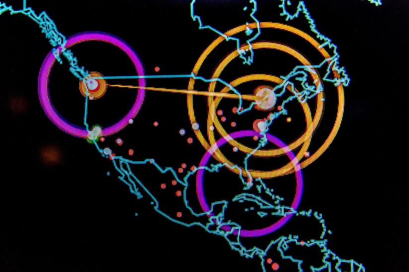 A close-up map of the United States is overlaid with circles and dots.