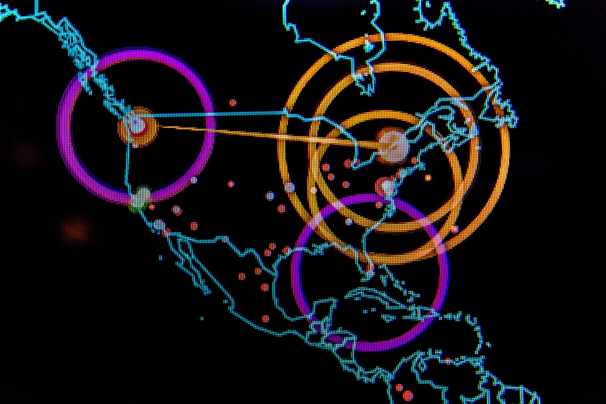 A close-up map of the United States is overlaid with circles and dots.