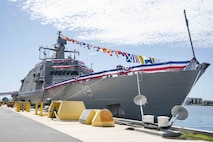 The newly-commissioned Independence-variant littoral combat ship USS St. Louis (LCS 19) flies ceremonious flags during its first moments of life at it’s homeport, Naval Station Mayport. LCS 19, the seventh ship in naval history to be named St. Louis, will be homeported at Naval Station Mayport.