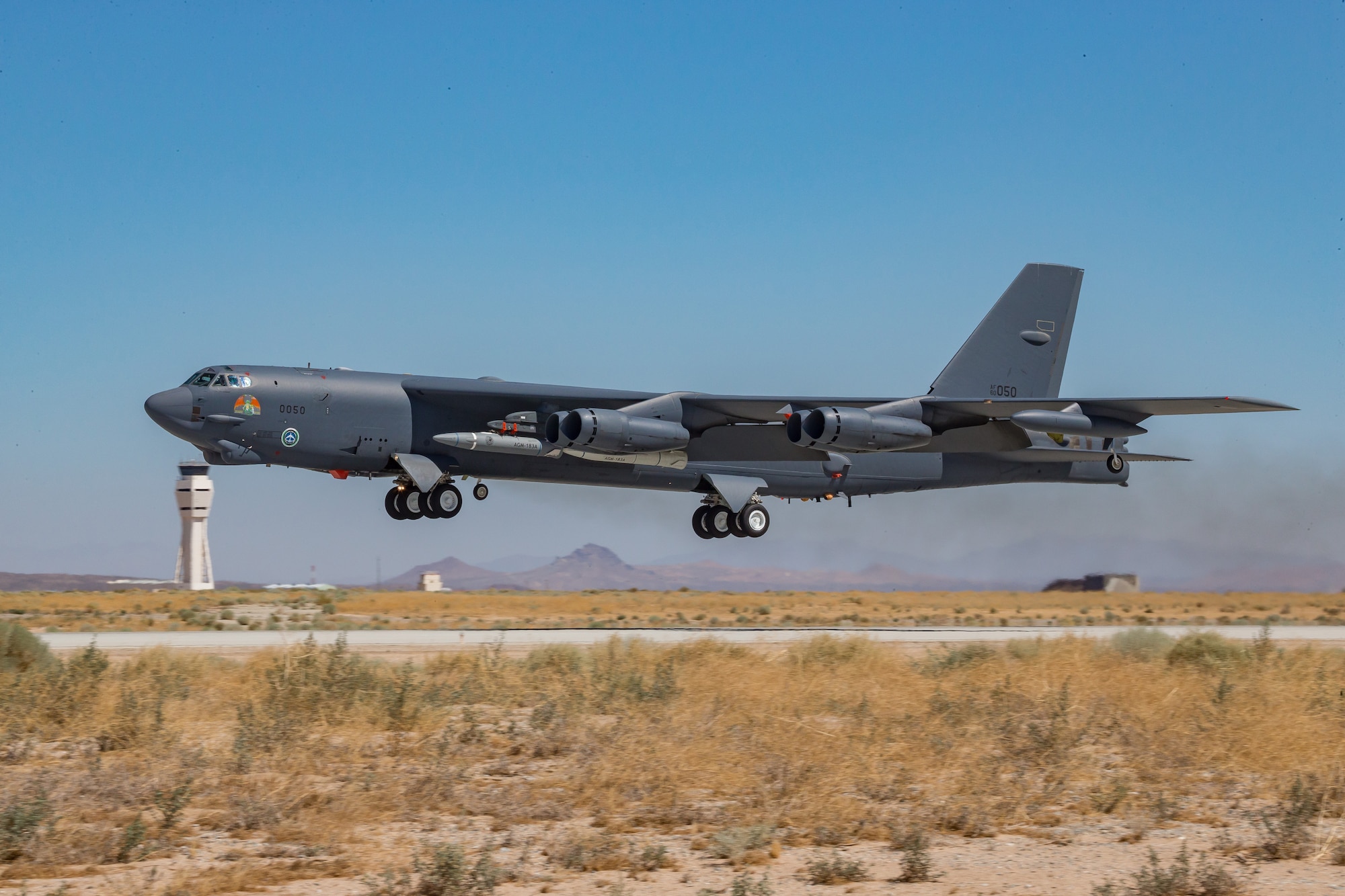 A B-52H Stratofortress assigned to the 419th Flight Test Squadron takes off from Edwards Air Force Base, California, Aug. 8. The aircraft conducted a captive-carry flight test of the AGM-183A Air-launched Rapid Response Weapon Instrumented Measurement Vehicle 2 hypersonic prototype at the Point Mugu Sea Range off the Southern California coast. (Air Force photo by Matt Williams)