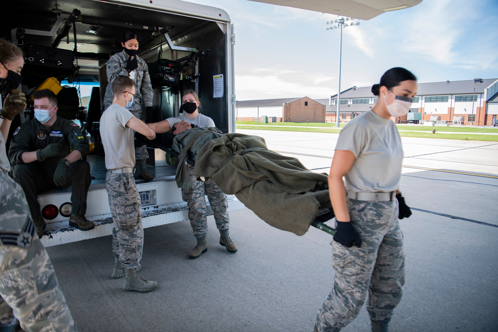Airmen with  923nd Airlift Wing, Aeromedical Evacuation Squadron, conduct Aero Medical Evacuation Readiness Mission (ARMS-Mission) training, on a C-130J from 314th Airlift Wing, August 6, 2020. ARMS-Mission training is required for AES Airmen to maintain their mission readiness.(U.S. Air Force photo by Senior Airman Brooke Spenner)