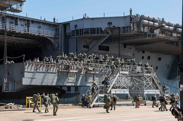 Sailors disembark USS Dwight D. Eisenhower (CVN 69) following the ship’s return to Naval Station Norfolk.