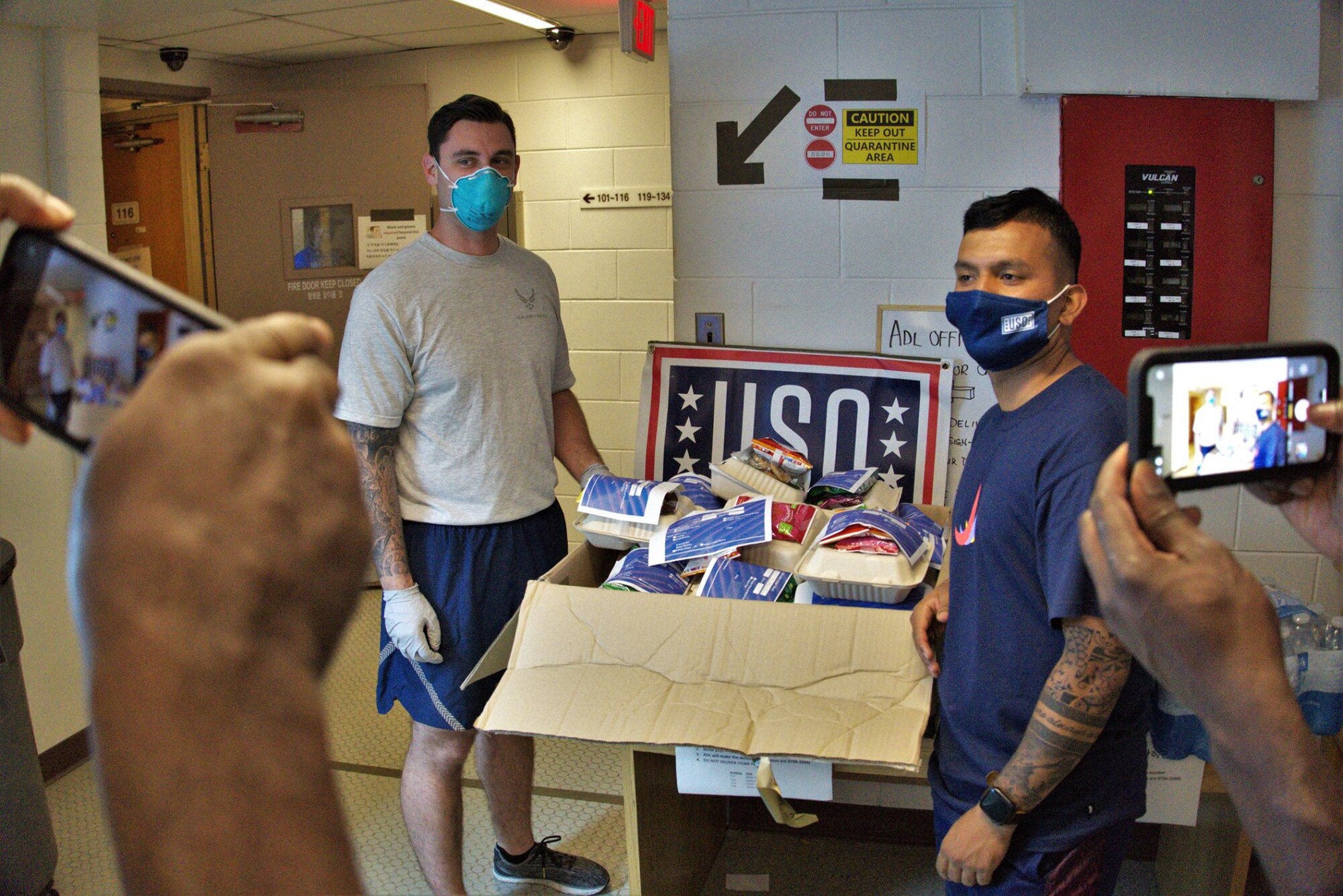 The United Service Organizations prepares and delivers hot meals to the quarantine dorms on Osan Air Base, Republic of Korea, July 20, 2020. Food is delivered to the occupants of the quarantine dorms daily as well as other things that they may want or need. (U.S. Air Force photo by Staff Sgt. Benjamin Bugenig)