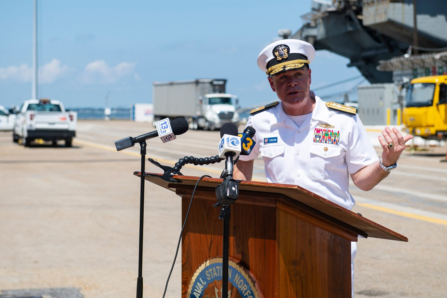 Rear Adm. Brendan McLane speaks to the press after USS Dwight D. Eisenhower (CVN 69) returned from a  regularly scheduled deployment.