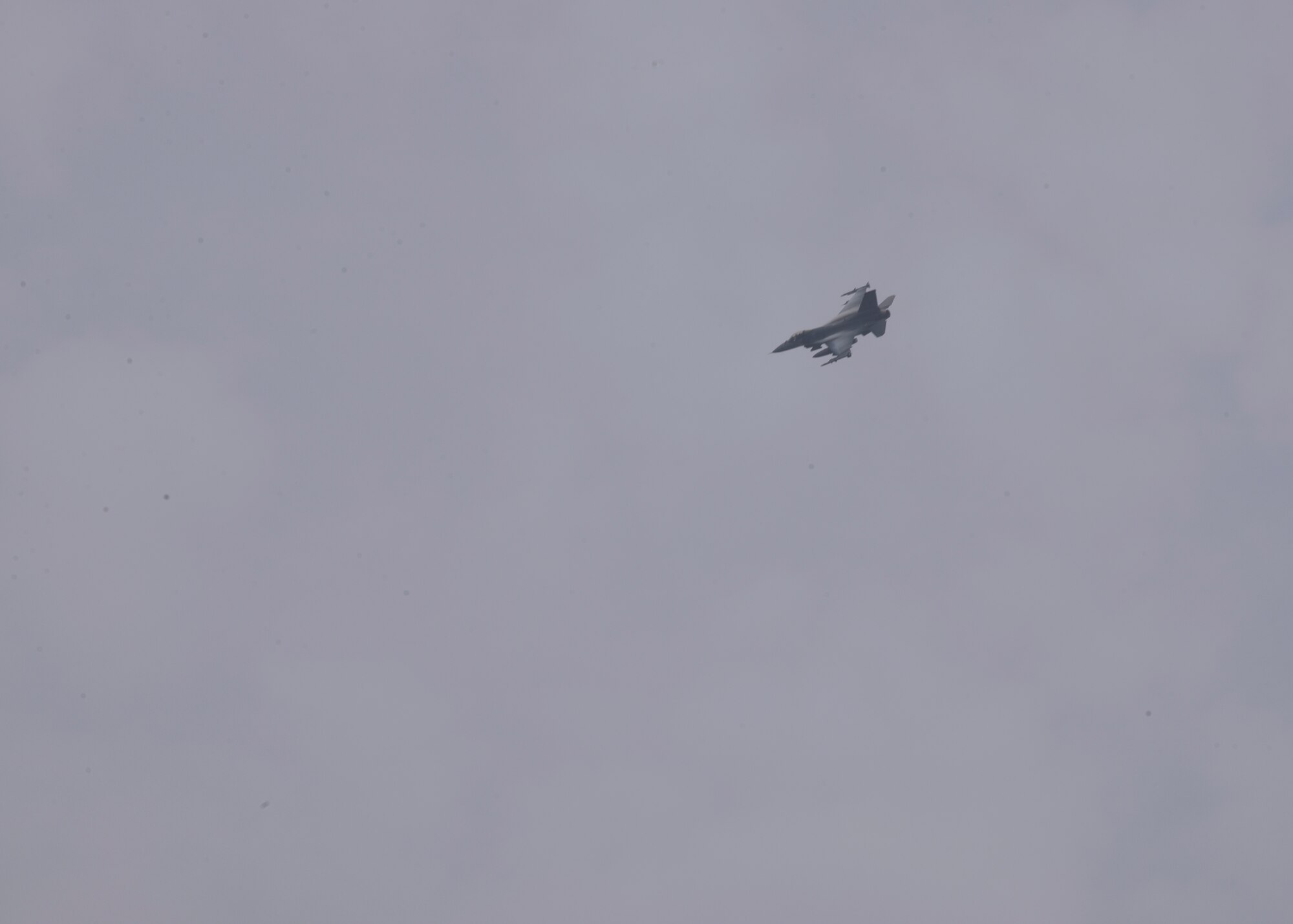 A U.S. Air Force F-16 Fighting Falcon, assigned to Misawa Air Base, Japan, performs low-level flying during Exercise Forest Thunder 20 at Draughon Range near Misawa Air Base, Japan, Aug. 6, 2020.  The U.S. Navy and Air Force conducted joint integrated training off the coast of Northern Japan. Units and personnel assigned to the USS Ronald Reagan Carrier Strike Group, Electronic Attack Squadron (VAQ) 131, and the 35th Fighter Wing began coordinated operations August 1. (U.S Air Force photo by Staff Sgt. Grace Nichols)