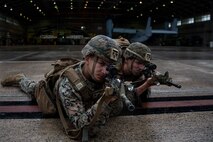 Marines with Battalion Landing Team, 2nd Battalion, 4th Marines, 31st Marine Expeditionary Unit (MEU), set up security during Tactical Recovery of Aircraft and Personnel (TRAP) training at Camp Futenma, Okinawa, Japan, July 1, 2020. Simulated TRAP missions allow Marines to rehearse realistic scenarios to improve their proficiency in recovering personnel and aircraft. The 31st MEU, the Marine Corps’ only continuously forward-deployed MEU, provides a flexible and lethal force ready to perform a wide range of military operations as the premier crisis response force in the Indo-Pacific region. (U.S. Marine Corps photo by Lance Cpl. Brienna Tuck)