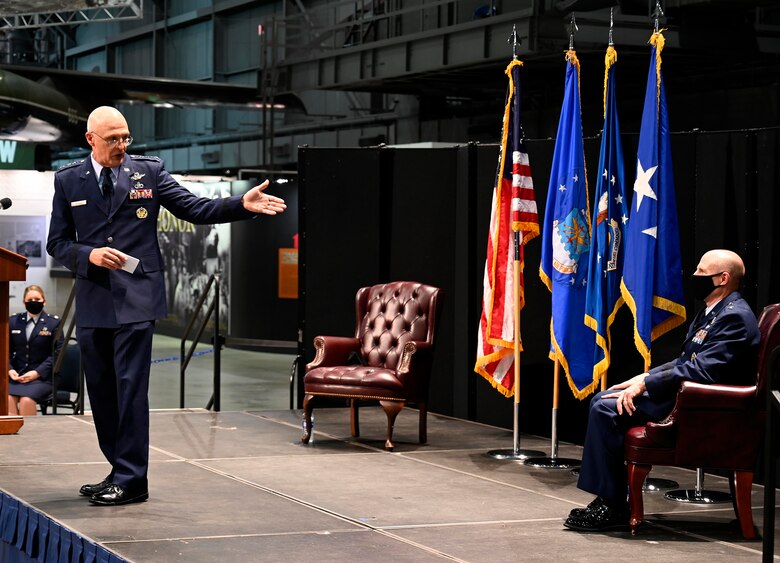 Gen. Arnold W. Bunch, Jr.,  Air Force Materiel Command Commander, speaks to the audience about the partnership between himself and Lt. Gen. Carl Schaefer, Air Force Materiel Command Deputy Commander, prior to his promotion to a lieutenant general Aug. 7 at the National Museum of the United States Air Force, Wright-Patterson Air Force Base, Ohio. (photo by Darrius Parker)
