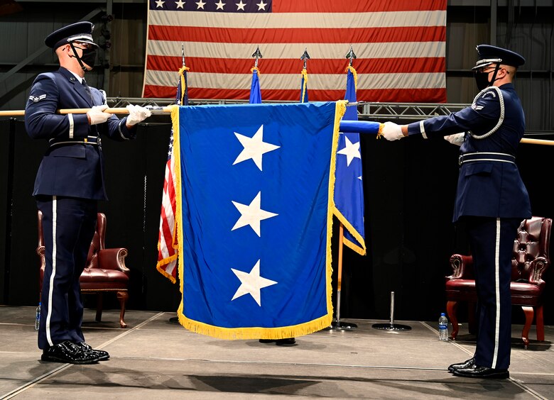 The U.S. Air Force honor guard presents the official flag of lieutenant general to Lt. Gen. Carl Schaefer, Air Force Materiel Command Deputy Commander, Aug. 7 at the National Museum of the United States Air Force, Wright-Patterson Air Force Base, Ohio. (photo by Darrius Parker)