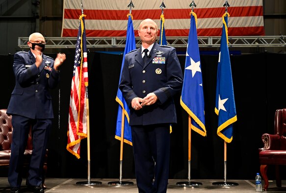 Gen. Arnold W. Bunch, Jr.,  Air Force Materiel Command Commander, speaks to the audience about the dedication and career of Lt. Gen. Carl Schaefer, Air Force Materiel Command Deputy Commander, prior to his promotion to a lieutenant general Aug. 7 at the National Museum of the United States Air Force, Wright-Patterson Air Force Base, Ohio. This accomplishment is significant, as it restores a three-star deputy commander to AFMC, in alignment with other Air Force major commands. This also allows him to receive a promotion, while serving in the same position. (photo by Darrius Parker)