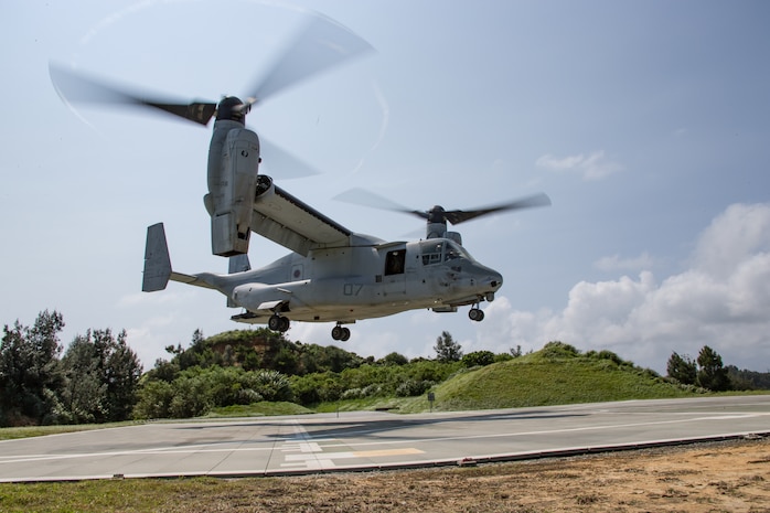 An MV-22B Osprey Tiltrotor aircraft lands during a training exercise at Landing Zone Swan off the coast of Okinawa, Japan, July 30.