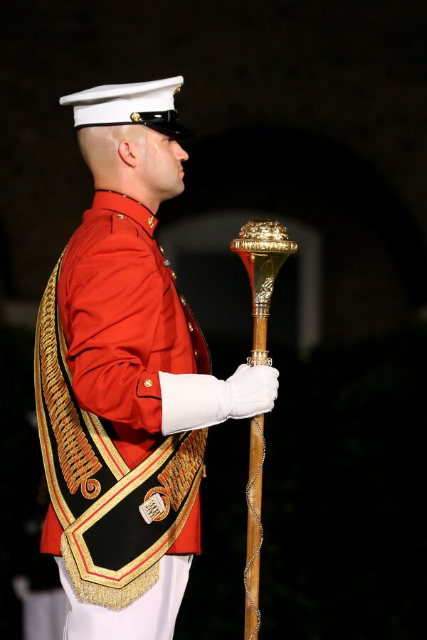 Gunnery Sgt. David Cox, acting drum major, “The Commandant’s Own,” U.S. Marine Drum and Bugle Corps, performs during the Staff Noncommissioned Officer Friday Evening Parade at Marine Barracks Washington, D.C., Aug. 7, 2020. Staff Noncommissioned Officers took charge and filled key leaders’ roles and billets throughout the parade. The 19th Sergeant Major of the Marine Corps, Sgt. Maj. Troy E. Black, hosted last night’s ceremony, and the guest of honor was the Senior Enlisted Advisor to the Chairman of the Joint Chiefs of Staff, Ramón “CZ” Colón-López. (U.S. Marine Corps photo by Lance Cpl. Allen Sanders)