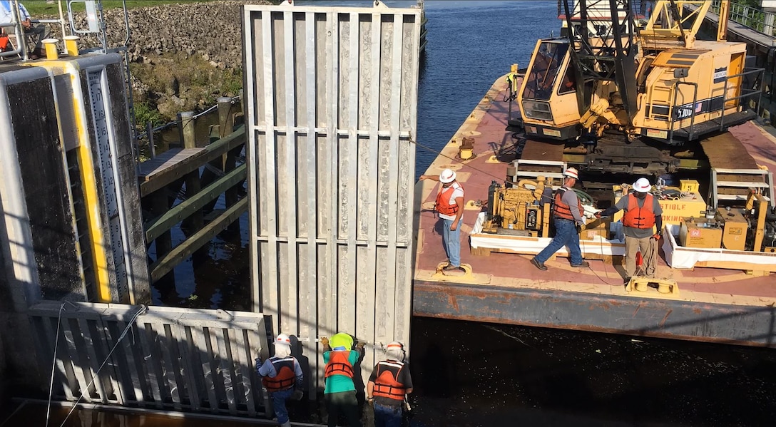 The tag line man helps to steady and control the load so it doesn’t twist as it is moved into position.