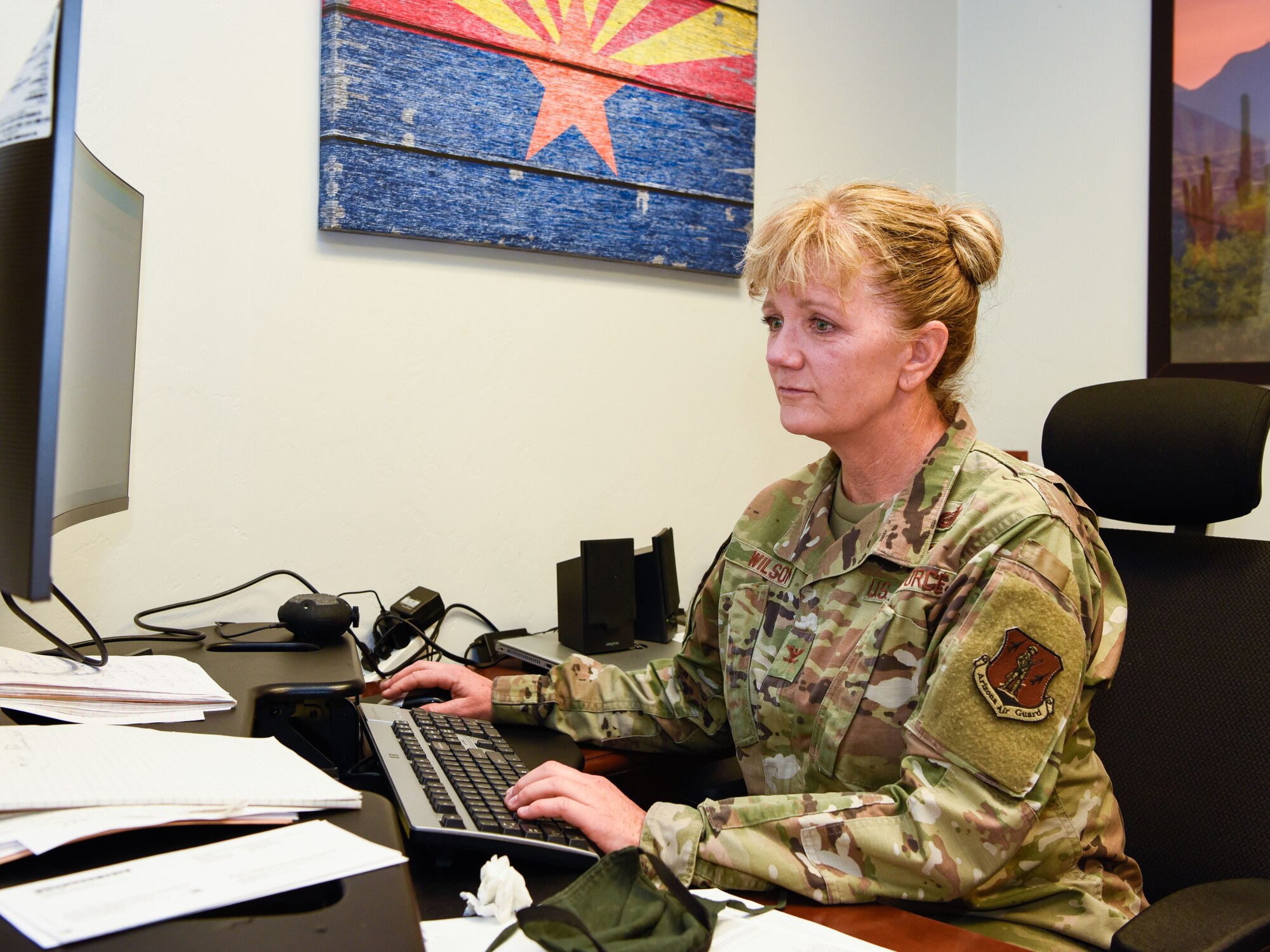 Col. Sandra Wilson, 162nd Wing Vice Commander, Arizona Air National Guard, works at her desk at Morris Air National Guard Base, Tucson, Ariz., July 26, 2020. Col. Wilson assumed the vice commander position in June 2020, and she is the first female and non-rated officer to hold that title. (U.S. Air National Guard Photo by Tech. Sgt. Stramler/Released)