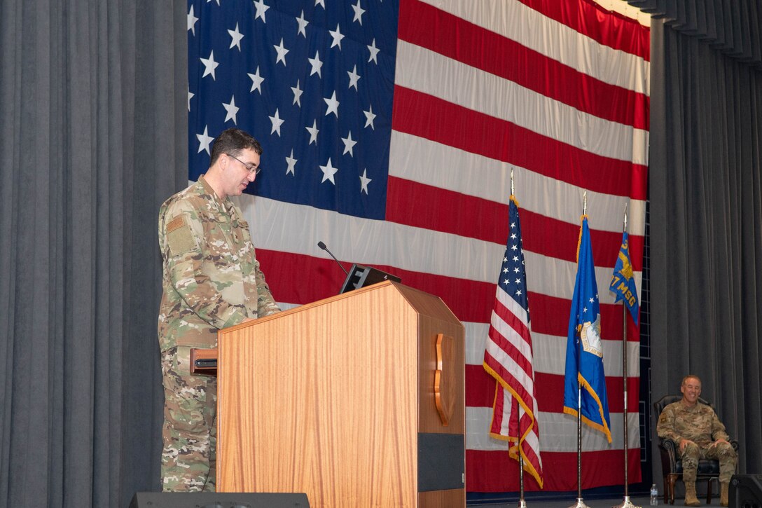 Air Force airman gives speech at podium