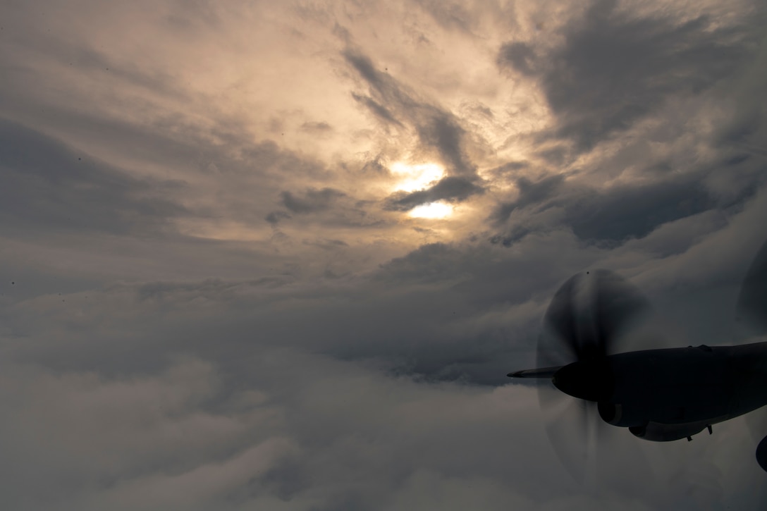Hurricane churns out the window of a C-130J.