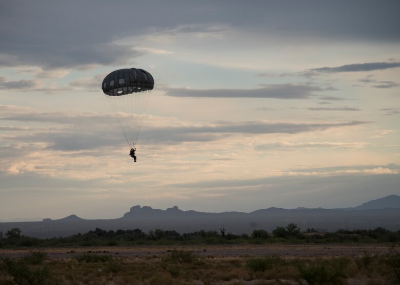 A photo of an Airman performing a parachute jump