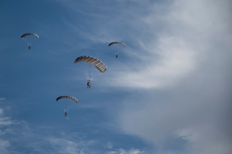 A photo of an Airman performing a parachute jump