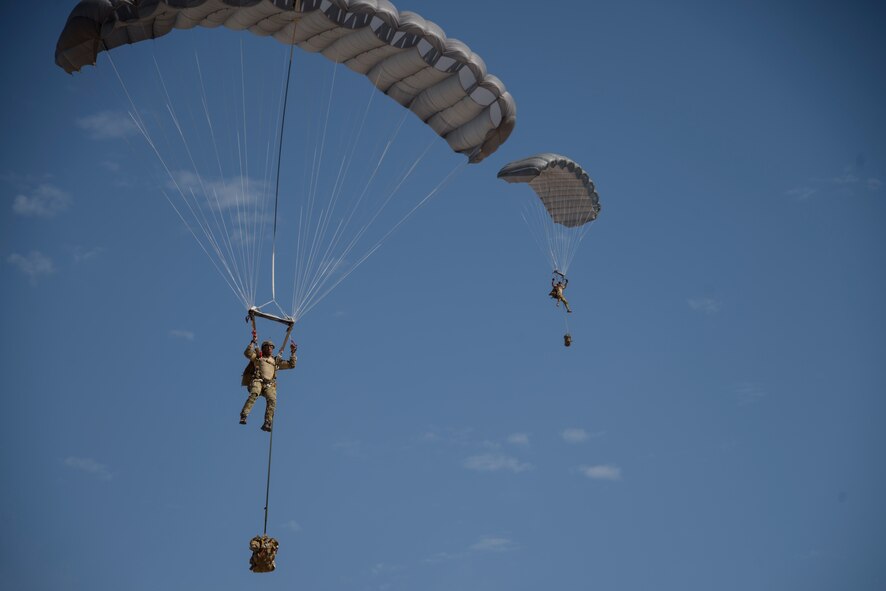 A photo of an Airman performing a parachute jump