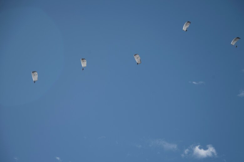 A photo of an Airman performing a parachute jump