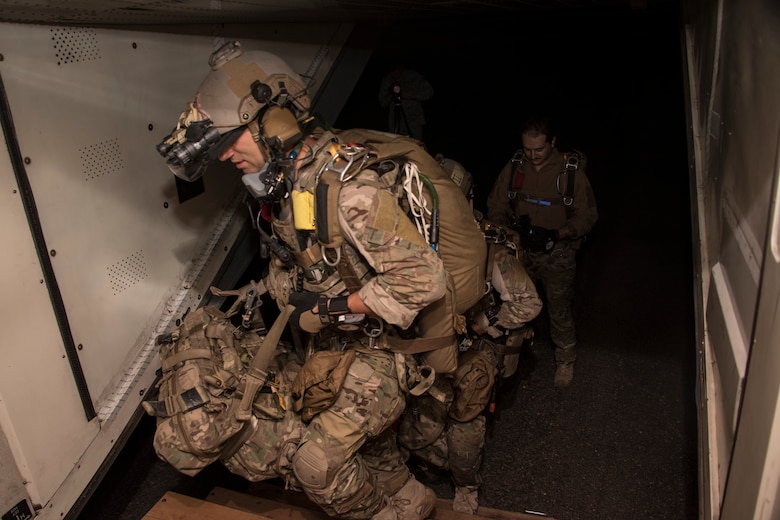 A photo of an Airman performing a parachute jump