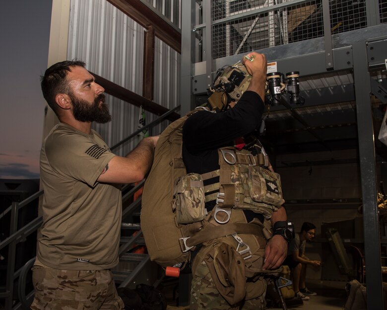 A photo of an Airman performing a parachute jump
