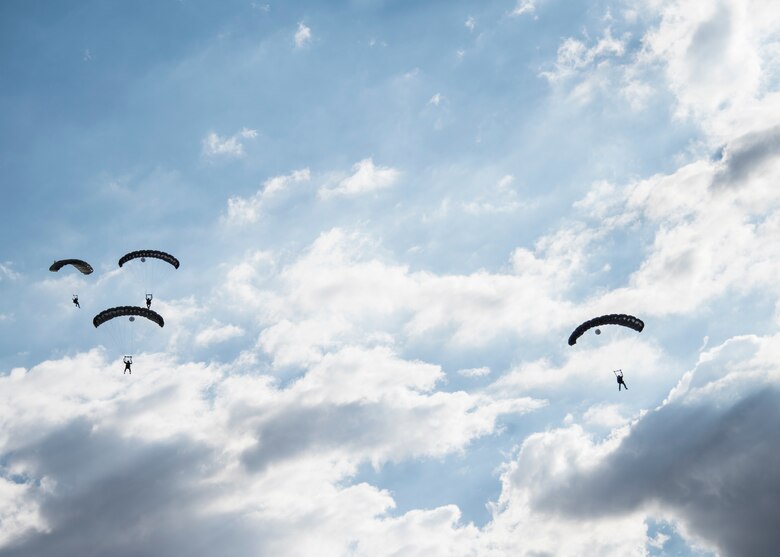 A photo of an Airman performing a parachute jump