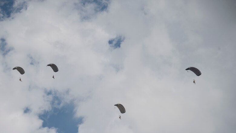 A photo of an Airman performing a parachute jump