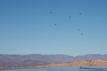 A photo of an Airman performing a parachute jump