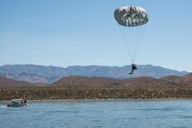 A photo of an Airman performing a parachute jump