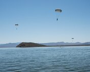 A photo of an Airman performing a parachute jump