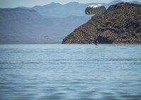 A photo of an Airman performing a parachute jump