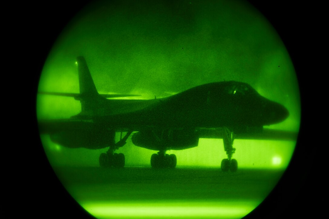 A 28th Bomb Wing B-1B Lancer emerges from a birdbath at Andersen Air Force Base, Guam, shortly after returning from a Bomber Task Force mission in the vicinity of Japan, Aug. 8, 2020. The BTF is deployed to Andersen AFB to support Pacific Air Forces’ training efforts with allies, partners and joint forces; and strategic deterrence missions to reinforce the rules-based order in the Indo-Pacific region. (U.S. Air Force photo by Airman 1st Class Christina Bennett)