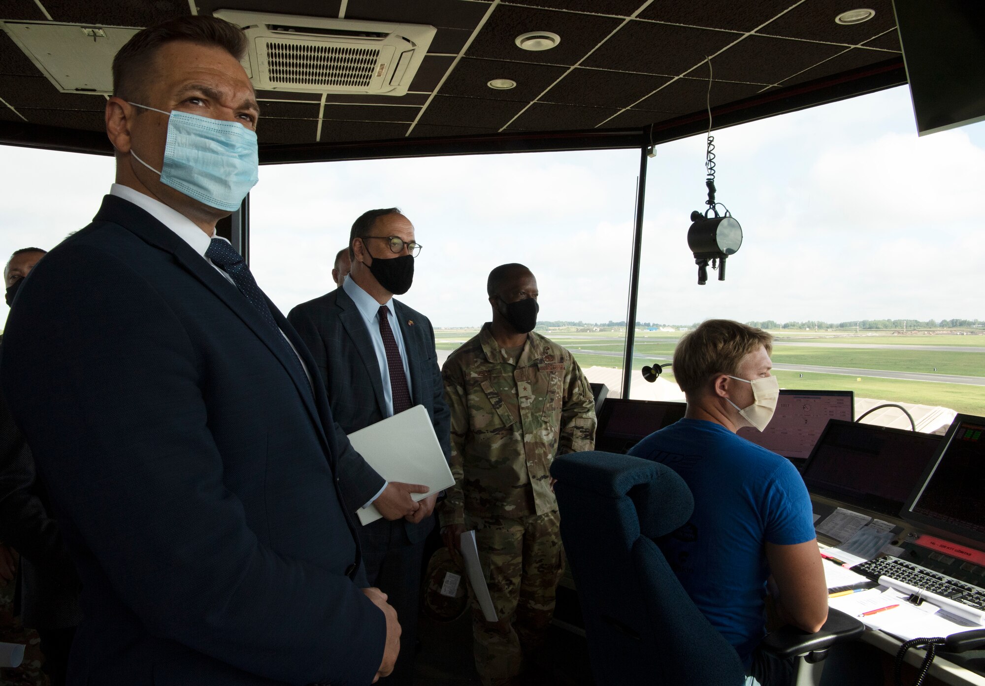 During a tour of the base, leaders visited the squadron operations building, air traffic control tower, and a hangar