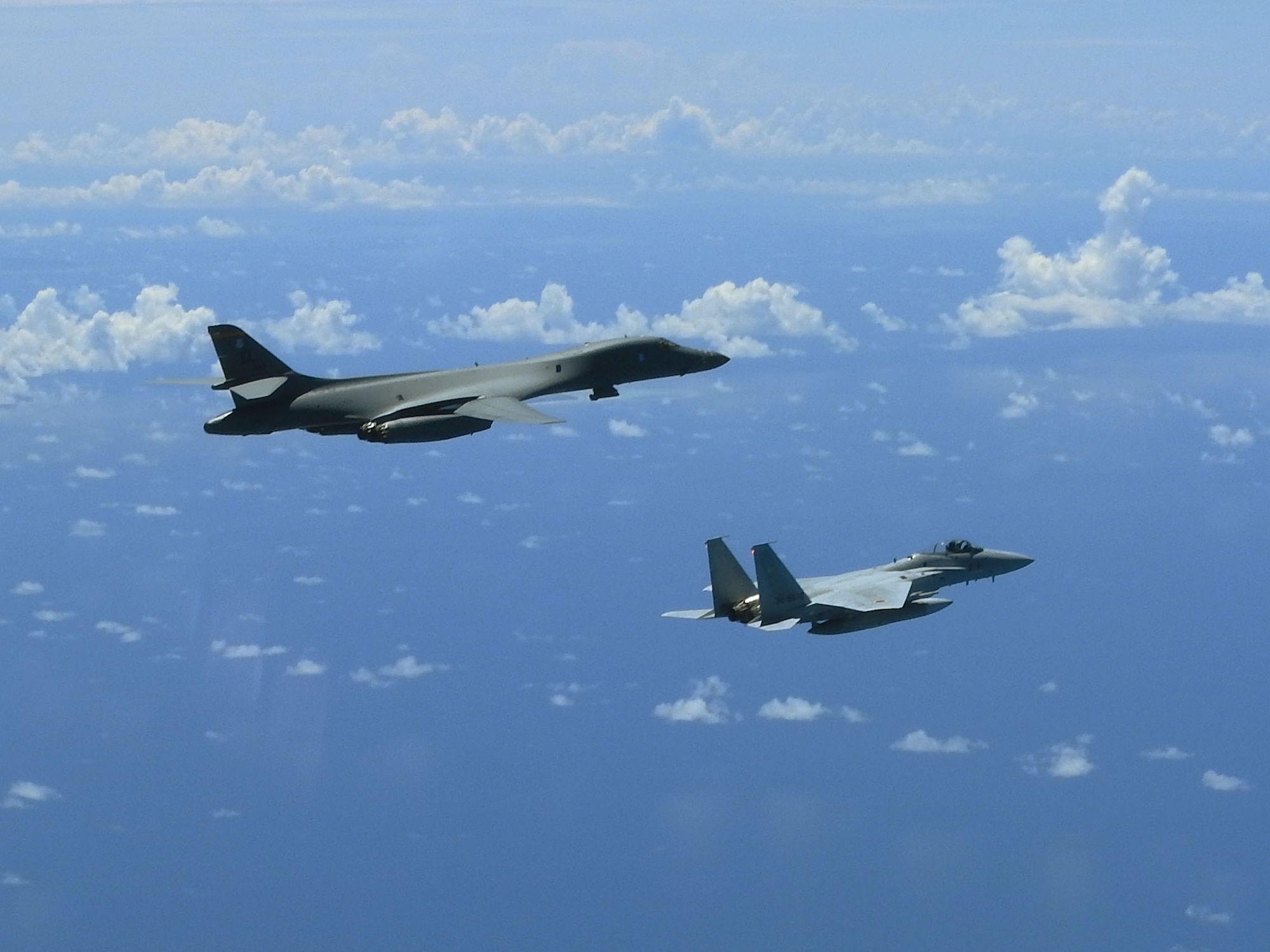 A B-1B Lancer conducts integration training with the Koku-Jieitai, or Japanese Air Self-Defense Force (JASDF) in the vicinity of Japan, Aug.  27, 2020. The B-1s integrated with Koku-Jietai to enhance bilateral interoperability and mutual readiness between the U.S. and Japan. (Photo Courtesy of JASDF)