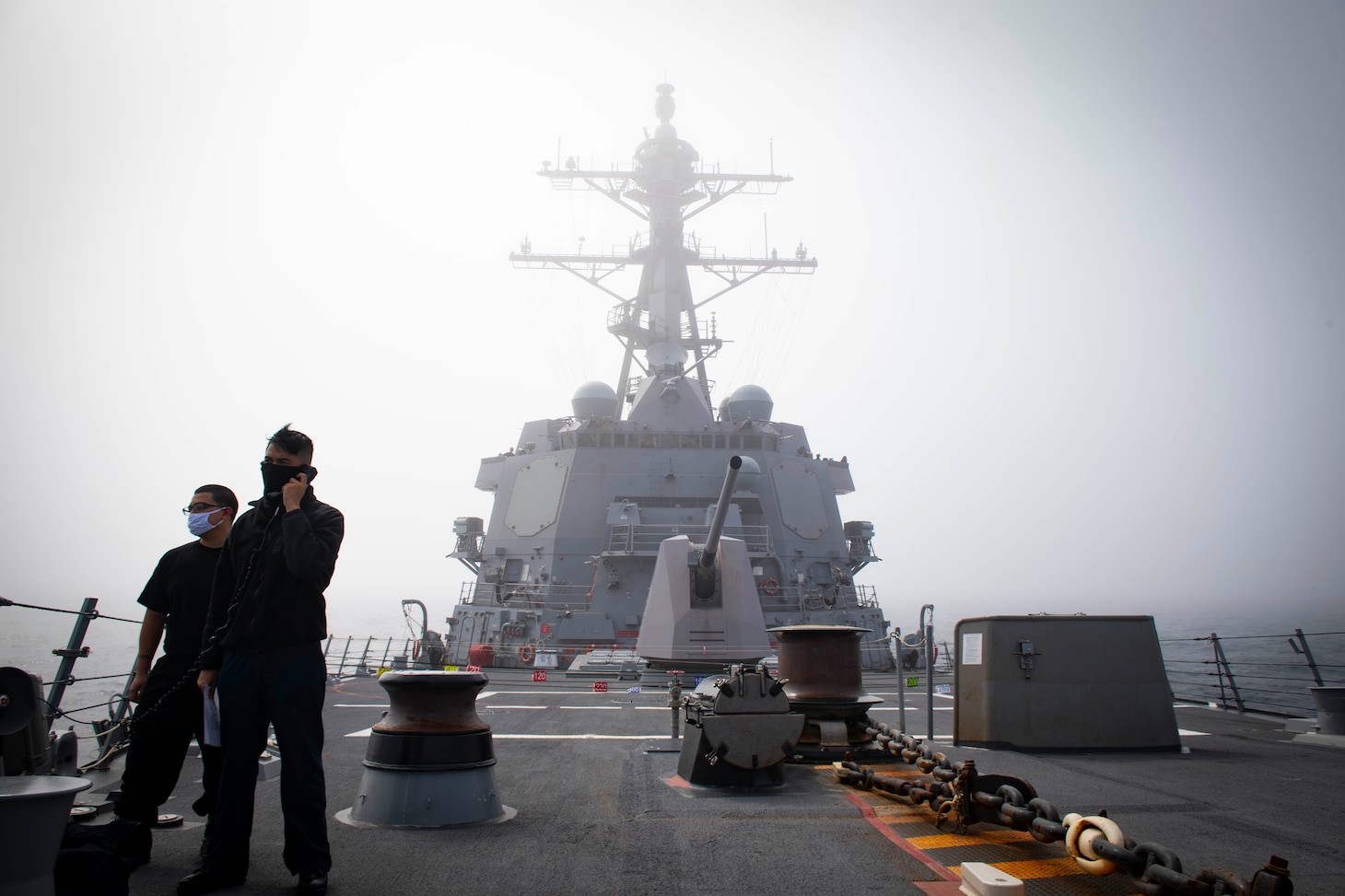 Sailors stand watch in low-visibility conditions aboard USS Thomas Hudner (DDG 116).