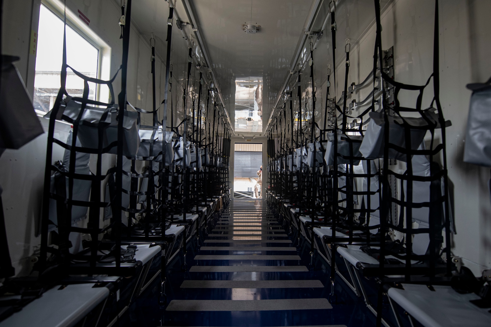 The 305th Air Mobility Wing plays a role in the fight against COVID-19 by delivering the latest isolated containment chamber developed for high-capacity transport of patients.