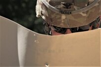 Commander of the 7th Mission Support Command and deputy commander of the 21st Theater Support Command, Col. Douglas A. LeVien, checks his target during a M17 pistol range qualification conducted by the 773rd Civil Support Team, 7th Civil Support Command, during exercise Forward and Ready 20 at United States Army Garrison Bavaria in Grafenwoehr, Aug. 1, 2020.