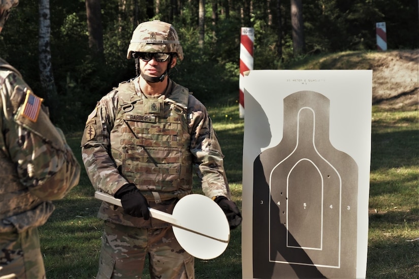 U.S. Army Reserve 1st Sgt. Domenic Barbeiro of the 773rd Civil Support Team, 7th Mission Support Command, conducts range safety operations for the M17 pistol qualification during exercise Forward and Ready 20 at United States Army Garrison Bavaria in Grafenwoehr, Aug. 1, 2020.
