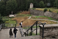 U.S. Army Reserve Soldiers of the 7th Mission Support Command inspect the crematorium grounds at the Flossenbuerg Concentration Camp Memorial as part of a staff ride emphasizing the remembrance of the Holocaust and the U.S. Military’s Code of Conduct during exercise Forward and Ready 20 at United States Army Garrison Bavaria in Grafenwoehr, Aug. 4, 2020.
