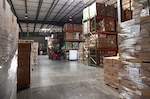 Michigan National Guard Soldiers organized more than $275 million of personal protective equipment and streamlined distribution processes so items can be same-day shipped from this Lansing warehouse the size of three football fields to municipalities and first responders throughout Michigan.