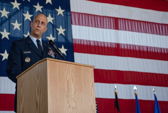 A person standing behind a podium.