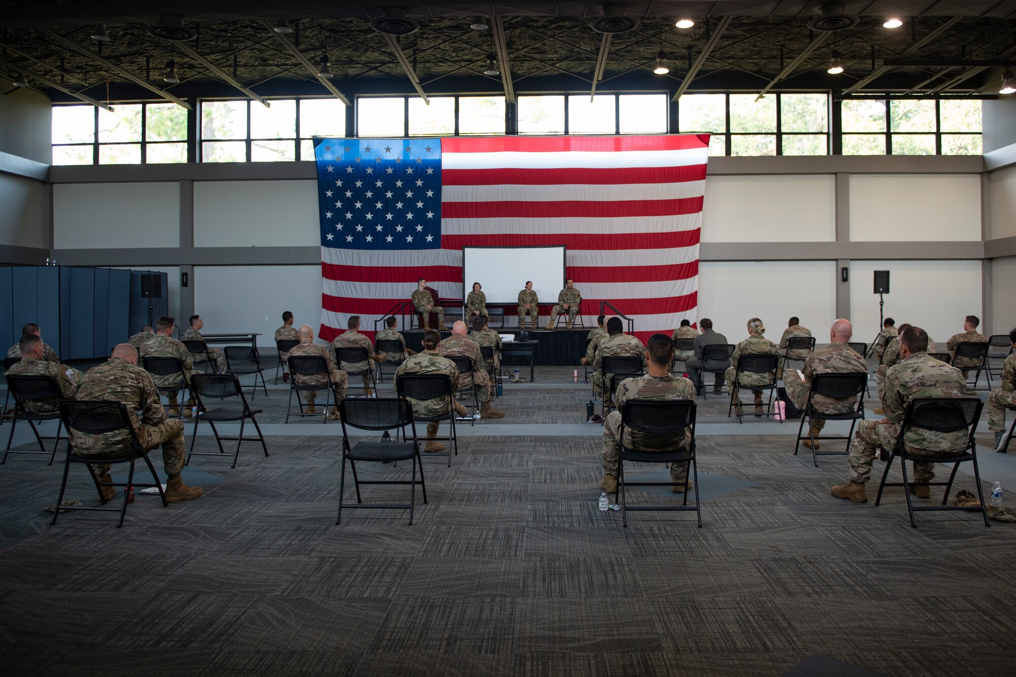 Photo of Airmen giving a briefing
