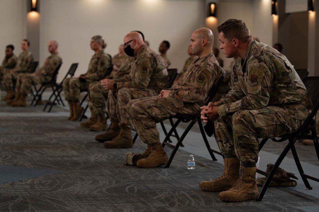Photo of Airmen listening to briefers at the First Sergeant Symposium