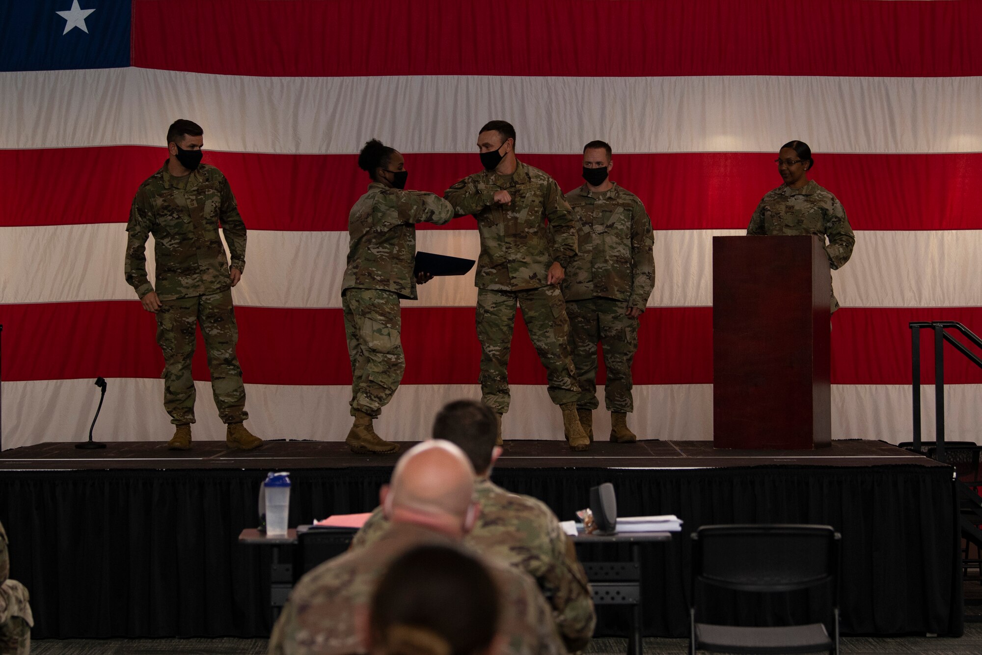 Photo of Airmen communicating at the First Sergeant Symposium