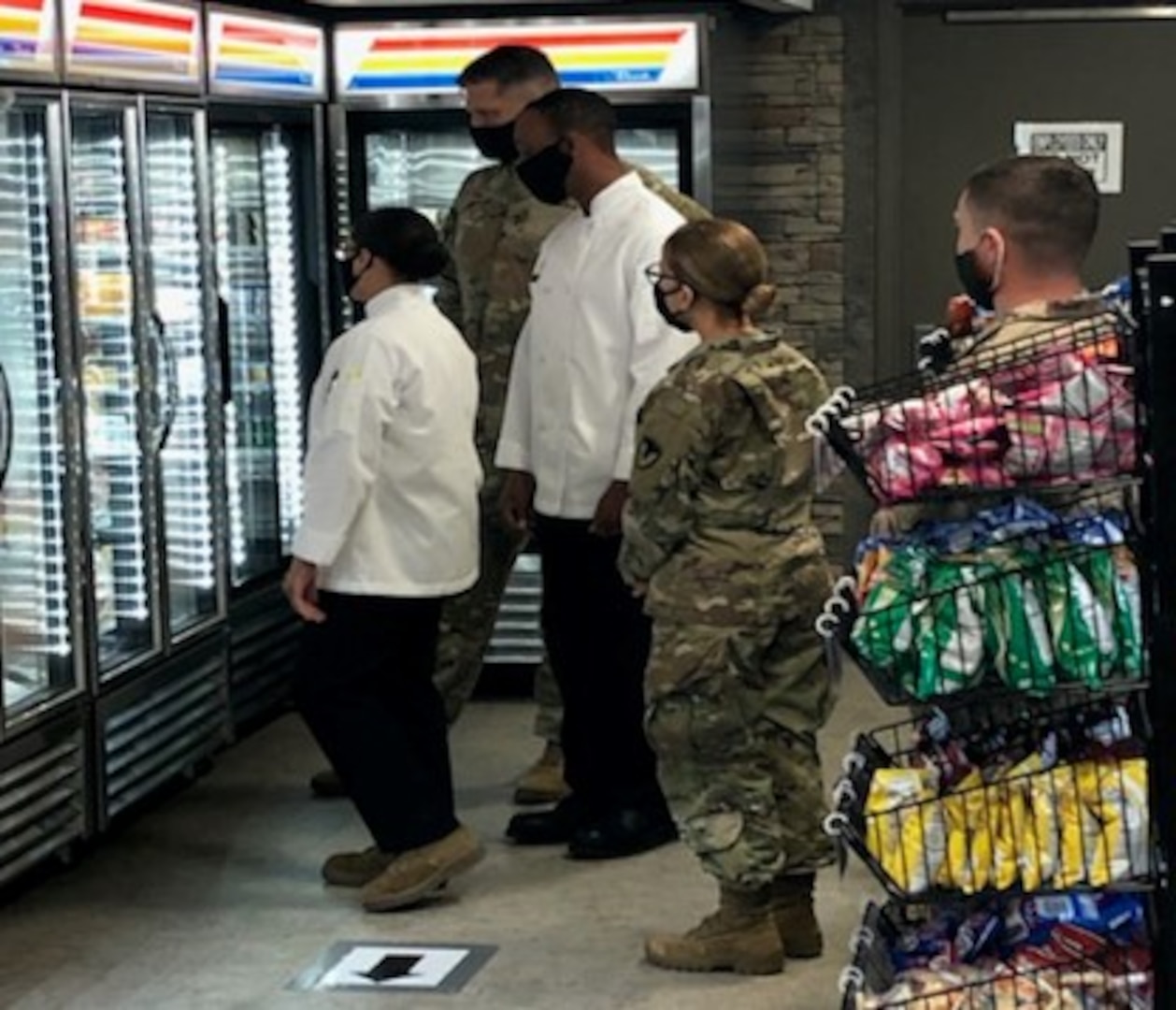 People look at a brand new food kisok