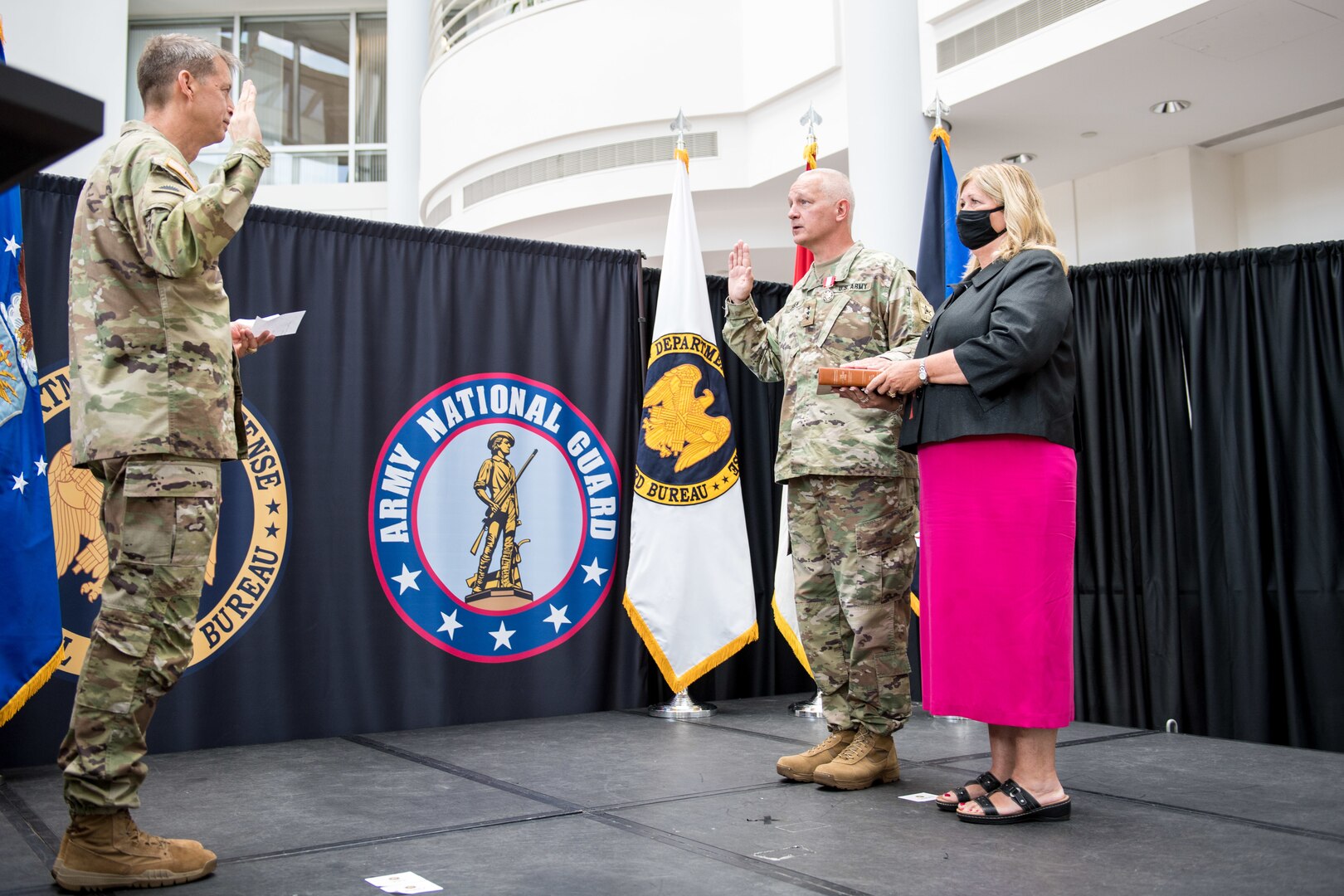 Gen. Daniel R. Hokanson, chief of the National Guard Bureau, administers the oath of office to Lt. Gen. Jon A. Jensen as the 22nd director of the Army National Guard Aug. 10, 2020, at the Temple Army National Guard Readiness Center in Arlington, Virginia.
